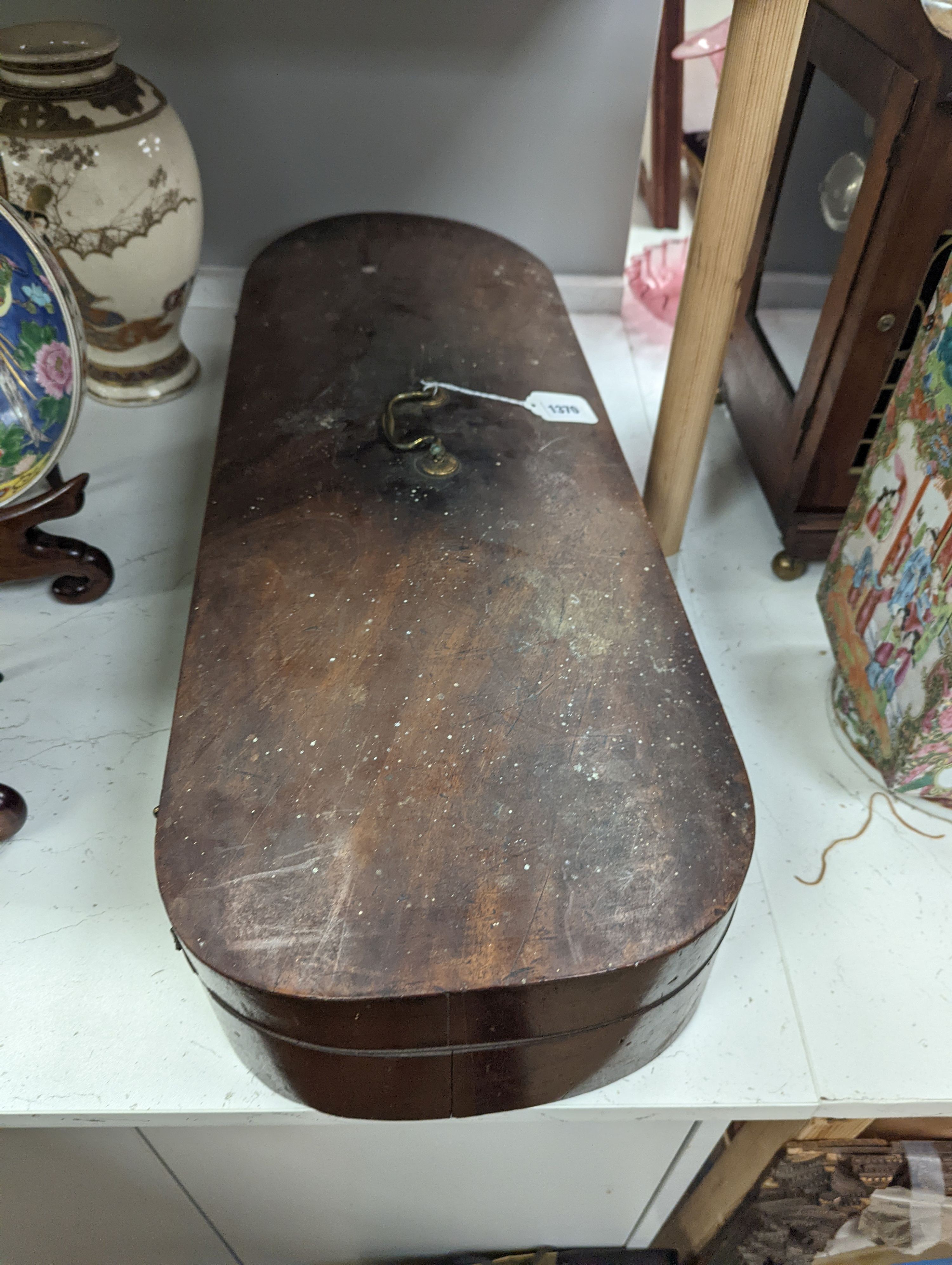 A violin in a mahogany case, case makers, Withers and sons, case 79 cms high.